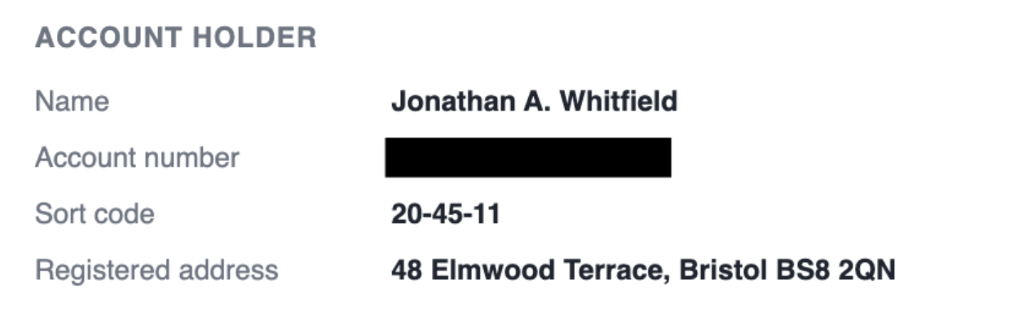 A bank statement in the Redacted editor with the account number covered by a solid black box.
